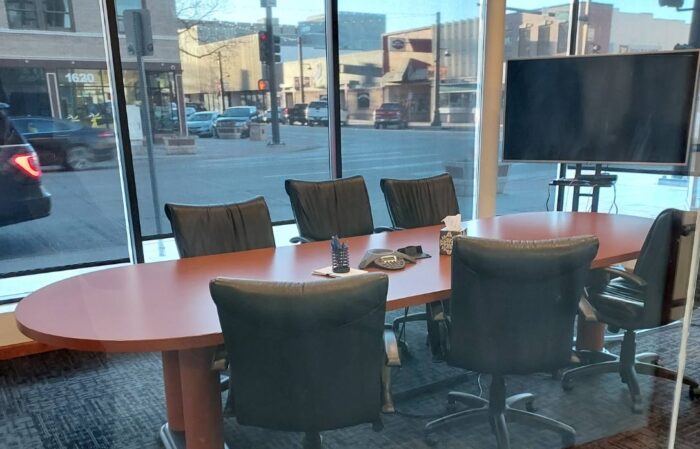 A conference room belonging to Wyoming Registered Agent, which looks out over downtown Cheyenne, WY.